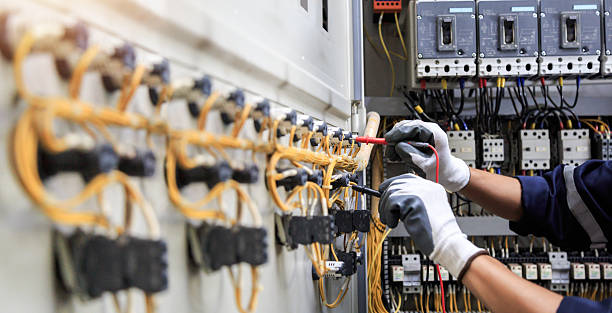 Professional Electrician technician working in Midvale, UT